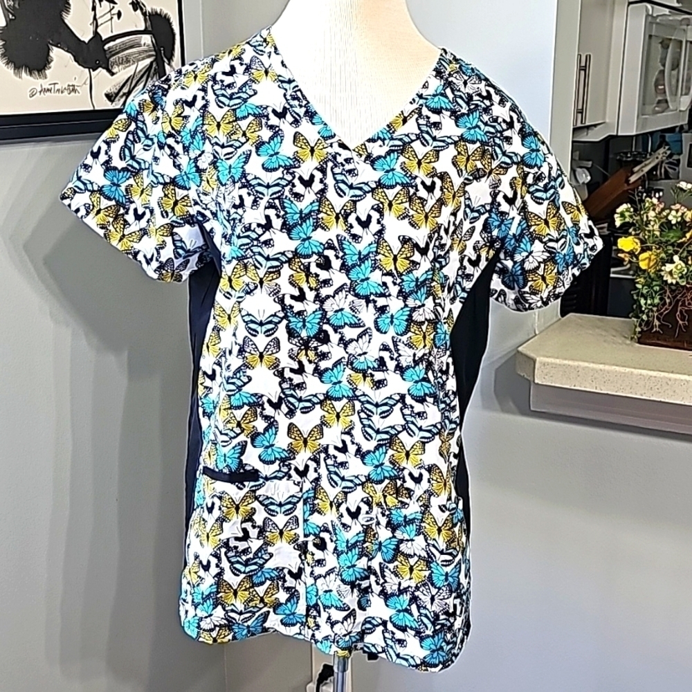 Wear for Care. Women's scrubs With butterfly 🦋 size medium. Excellent condition